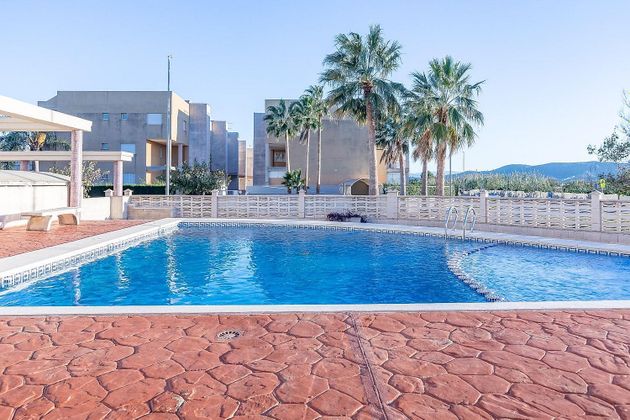 Foto 1 de Piso en venta en Xeraco de 2 habitaciones con terraza y piscina