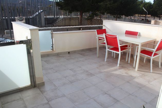 Foto 2 de Casa adossada en venda a El Algar de 3 habitacions amb terrassa i piscina