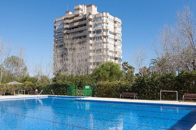 Foto 1 de Pis en venda a El Saler de 4 habitacions amb piscina i jardí