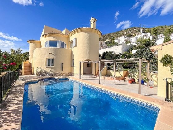 Foto 1 de Venta de casa en Jalón/Xaló de 4 habitaciones con terraza y piscina