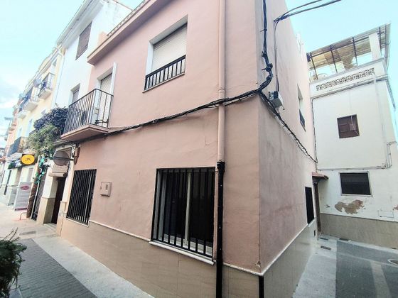 Foto 1 de Casa adosada en venta en Beniarjó de 6 habitaciones con aire acondicionado
