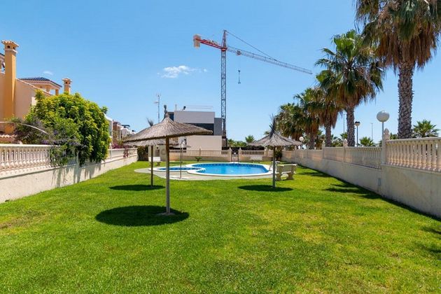 Foto 2 de Casa adossada en venda a Cabo Roig - La Zenia de 2 habitacions amb terrassa i piscina
