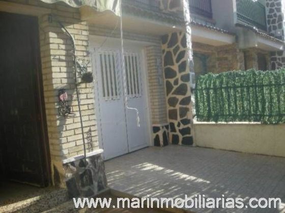 Foto 1 de Casa adosada en venta en La Palma de 4 habitaciones con balcón y aire acondicionado