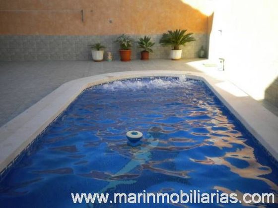 Foto 2 de Casa adossada en venda a Magdalena de 5 habitacions amb terrassa i piscina