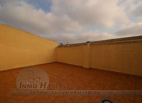 Foto 1 de Casa adosada en venta en El Forn d´Alcedo de 4 habitaciones con terraza y garaje