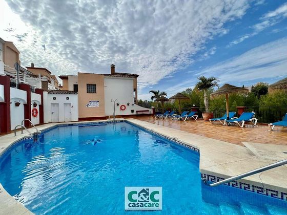 Foto 1 de Piso en venta en calle Vélez Málaga de 2 habitaciones con terraza y piscina