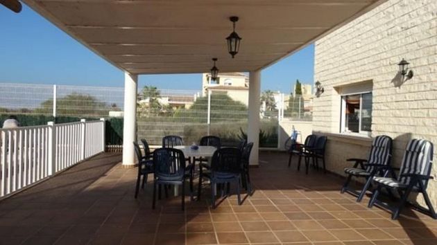 Foto 2 de Chalet en venta en Playa del Esparto-Veneziola de 6 habitaciones con terraza y piscina