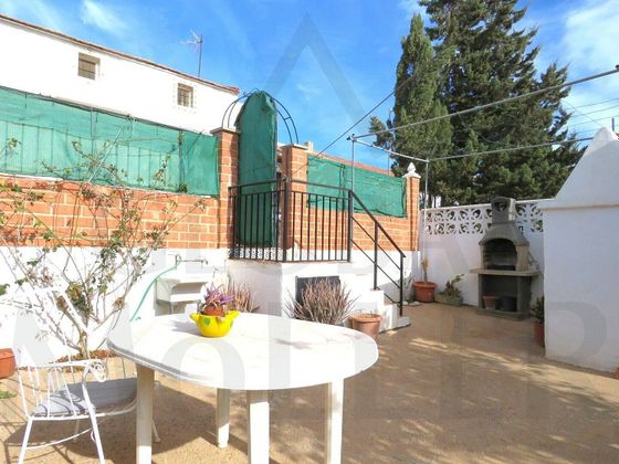 Foto 1 de Casa adossada en venda a calle Los Vidales de 3 habitacions amb garatge i jardí