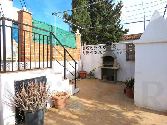 Foto 2 de Venta de casa adosada en calle Los Vidales de 3 habitaciones con garaje y jardín