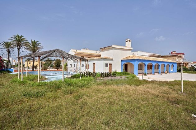 Foto 1 de Venta de chalet en El Perellonet de 10 habitaciones con terraza y piscina