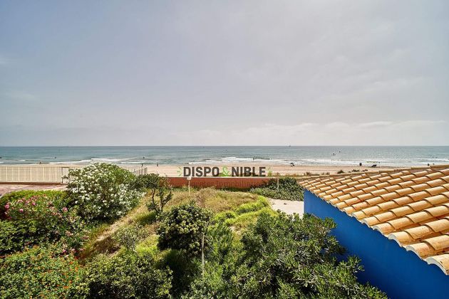 Foto 2 de Venta de chalet en El Perellonet de 10 habitaciones con terraza y piscina