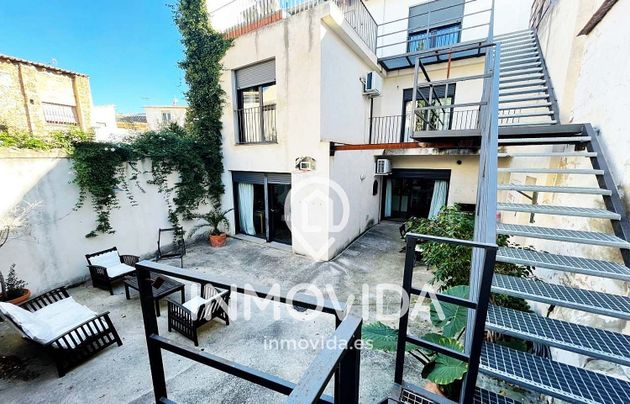 Foto 1 de Casa adossada en venda a calle Abat Pla de 6 habitacions amb terrassa i garatge