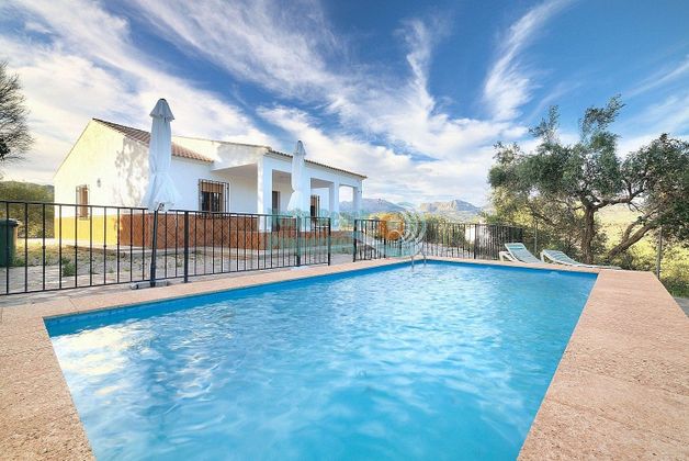Foto 1 de Casa en venda a Comares de 4 habitacions amb piscina i jardí