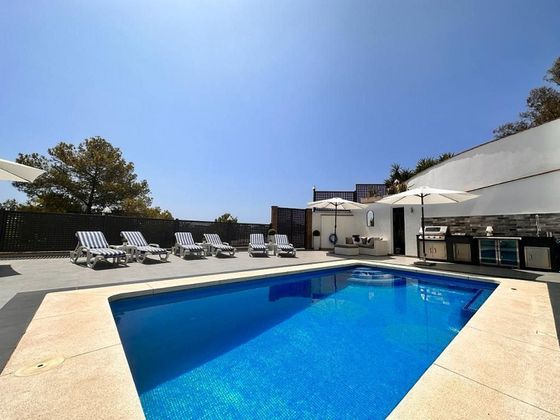 Foto 1 de Casa en venda a El Pinar - Palacio de Congresos de 5 habitacions amb terrassa i piscina