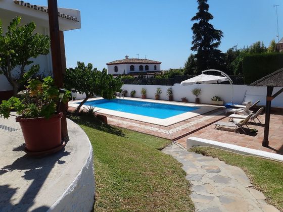 Foto 1 de Venta de chalet en Churriana de 4 habitaciones con terraza y piscina