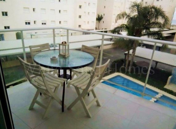 Foto 1 de Piso en venta en Daimús de 2 habitaciones con piscina y balcón