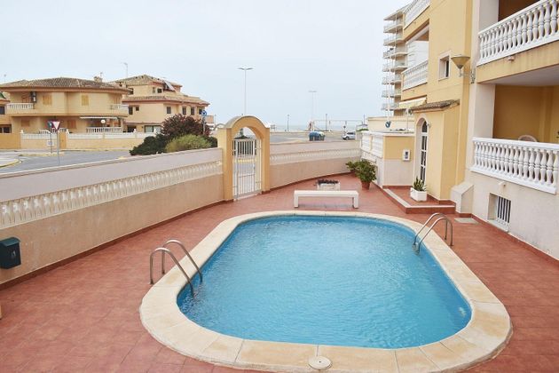 Foto 1 de Venta de piso en El Perelló - Les Palmeres - Mareny de Barraquetes de 3 habitaciones con terraza y piscina
