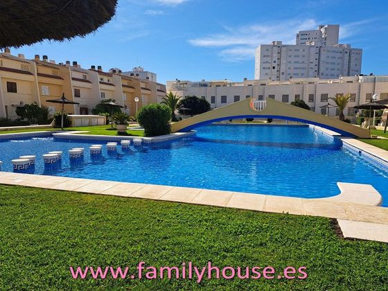 Foto 1 de Casa en venda a El Perellonet de 4 habitacions amb terrassa i piscina