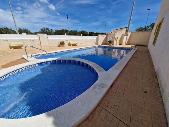 Foto 1 de Venta de dúplex en Santiago de la Ribera de 2 habitaciones con terraza y piscina
