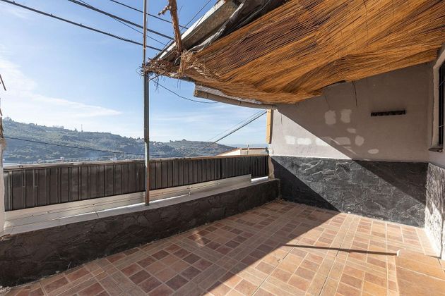 Foto 1 de Venta de casa en Cogollos de la Vega de 3 habitaciones con terraza y balcón
