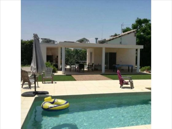 Foto 1 de Venta de chalet en Benicull de Xuquer de 2 habitaciones con terraza y piscina