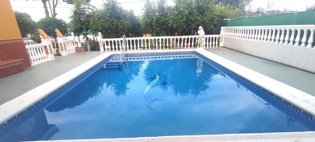Foto 1 de Casa en venda a Guillena de 3 habitacions amb terrassa i piscina