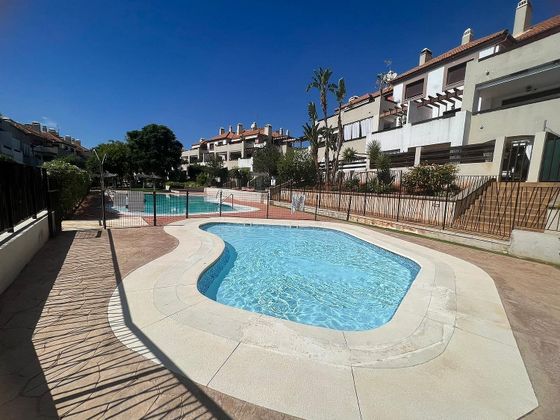 Foto 1 de Venta de piso en Guillena de 2 habitaciones con terraza y piscina