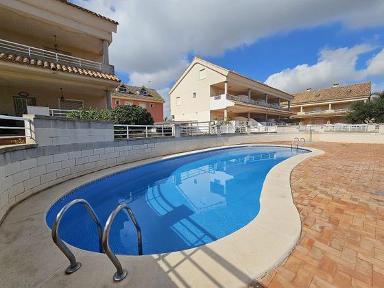 Foto 1 de Casa adossada en lloguer a El Perelló - Les Palmeres - Mareny de Barraquetes de 4 habitacions amb terrassa i piscina