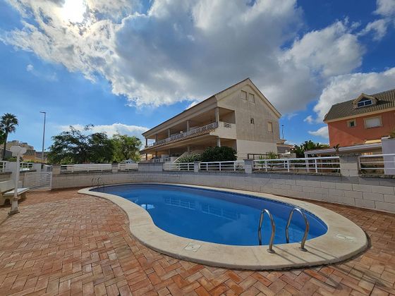 Foto 2 de Casa adossada en lloguer a El Perelló - Les Palmeres - Mareny de Barraquetes de 4 habitacions amb terrassa i piscina