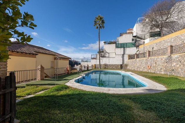 Foto 1 de Venta de dúplex en calle Cuevas del Palomo de 2 habitaciones con terraza y piscina