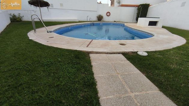 Foto 1 de Casa en venda a Churriana de 4 habitacions amb terrassa i piscina
