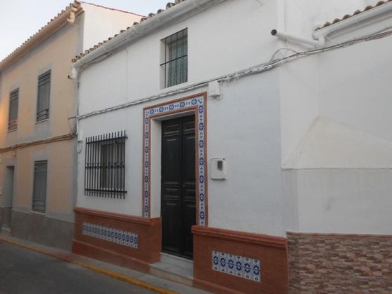 Foto 1 de Casa adossada en venda a Carrión de los Céspedes de 4 habitacions amb balcó