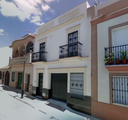 Foto 1 de Venta de casa adosada en Alcalá del Río de 3 habitaciones con terraza