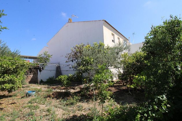 Foto 1 de Casa adossada en venda a Churriana de 3 habitacions amb garatge i jardí
