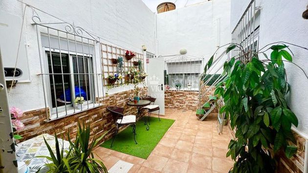 Foto 1 de Casa en venta en Águilas ciudad de 4 habitaciones con terraza y aire acondicionado