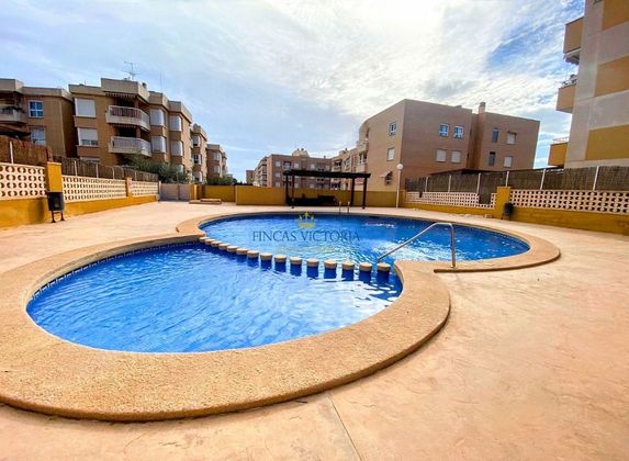 Foto 1 de Piso en venta en Águilas ciudad de 2 habitaciones con terraza y piscina