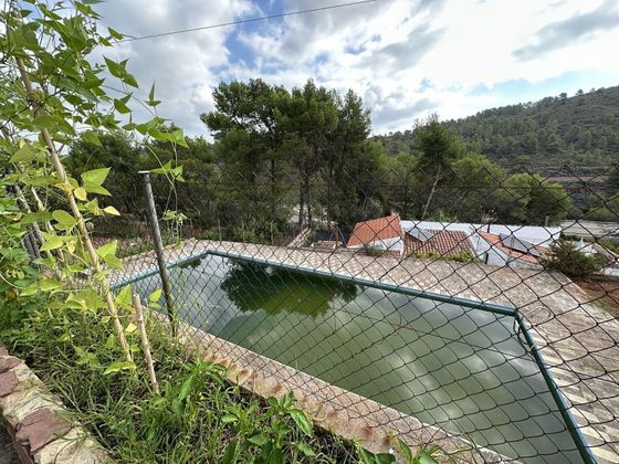Foto 2 de Chalet en venta en Algimia de Alfara de 3 habitaciones con terraza y piscina