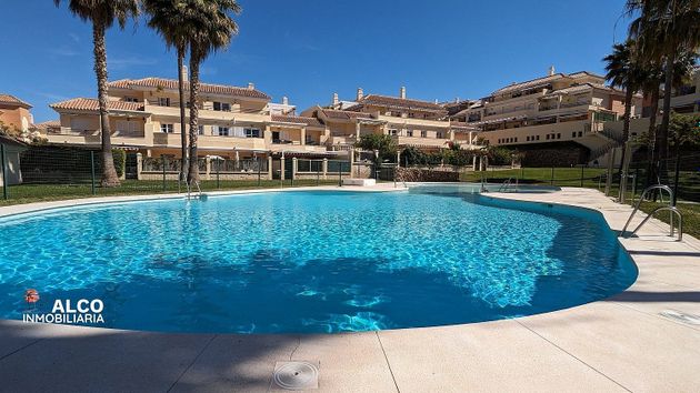 Foto 1 de Venta de piso en Caleta de Vélez de 3 habitaciones con terraza y piscina