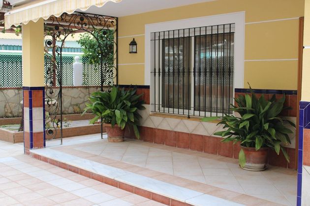 Foto 2 de Venta de casa adosada en Los Boliches de 11 habitaciones con terraza y jardín