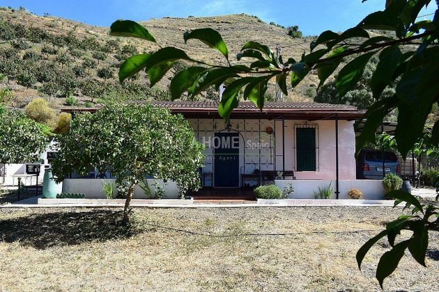Foto 1 de Casa rural en venta en Benamargosa de 2 habitaciones con piscina y jardín
