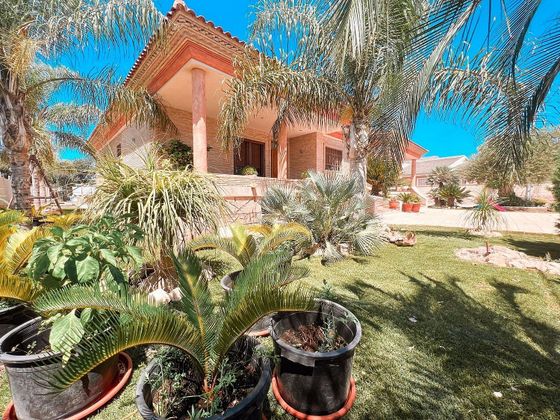 Foto 1 de Venta de chalet en El Raal de 4 habitaciones con terraza y jardín