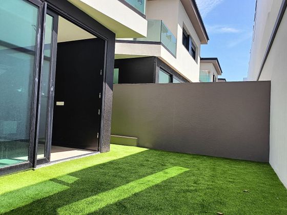 Foto 1 de Casa adossada en venda a urbanización El Laurel de 3 habitacions amb terrassa i garatge
