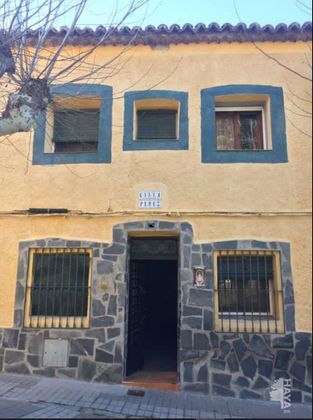 Foto 1 de Venta de casa adosada en Yunquera de Henares de 5 habitaciones y 239 m²
