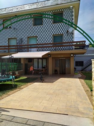 Foto 2 de Casa adossada en venda a Nalda de 4 habitacions amb terrassa i piscina