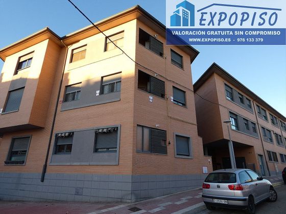 Foto 1 de Venta de piso en Puebla de Alfindén (La) de 2 habitaciones con terraza y garaje