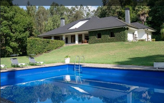 Foto 1 de Xalet en venda a Urduliz de 8 habitacions amb terrassa i piscina