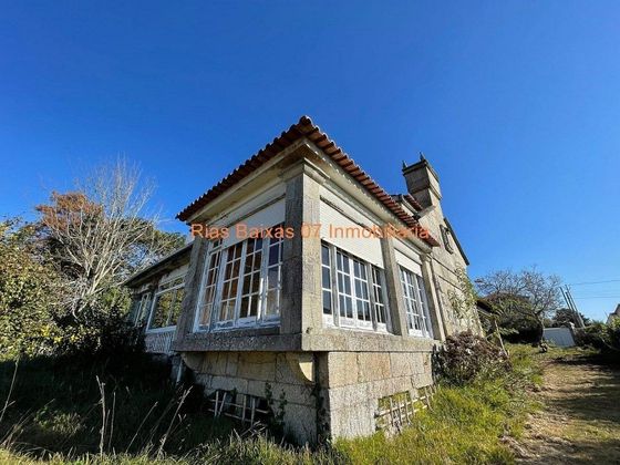 Foto 1 de Venta de chalet en Alcabre - Navia - Comesaña de 4 habitaciones con terraza y garaje
