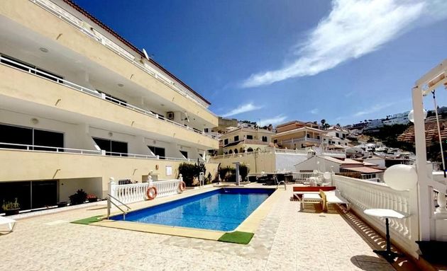 Foto 1 de Venta de piso en Costa Adeje de 2 habitaciones con terraza y piscina