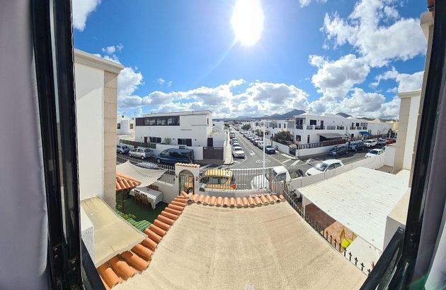 Foto 2 de Venta de casa adosada en Playa Honda de 4 habitaciones con terraza