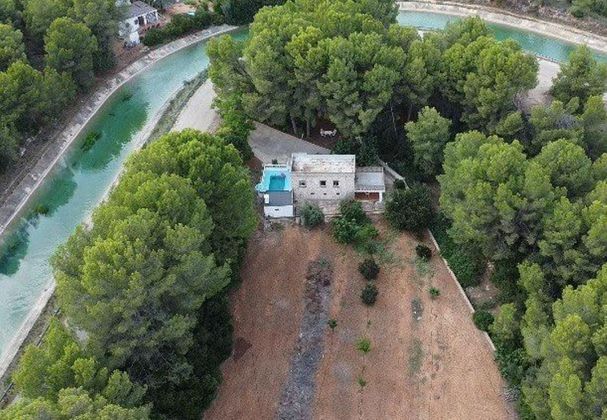 Foto 1 de Casa rural en venta en Guadassuar de 2 habitaciones con terraza y piscina